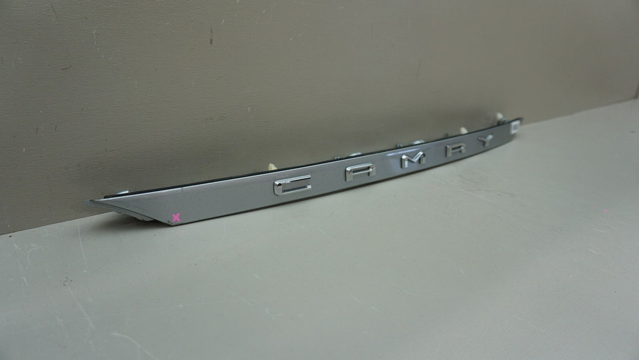 2018-2023 TOYOTA CAMRY REAR TAILGATE BADGE TRIM 76811-06B70 OEM