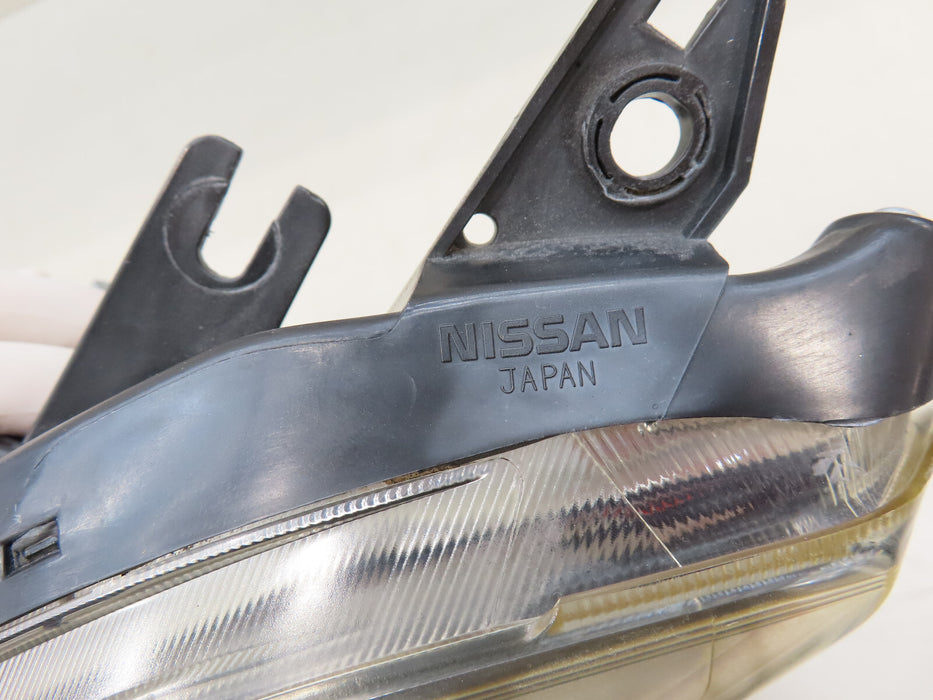 2008-2013 NISSAN ROGUE FRONT LEFT DRIVER SIDE HEADLIGHT HALOGEN OEM