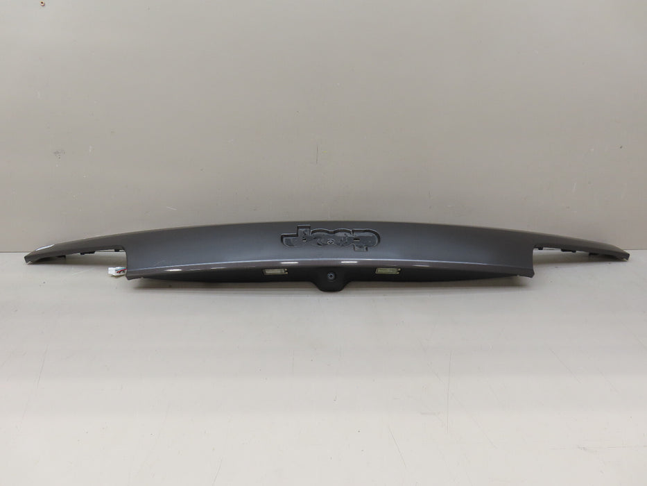 2014-2024 JEEP GRAND CHEROKEE REAR TRIM PANEL MOLDING W/CAMERA OEM 1WD55TRMAD