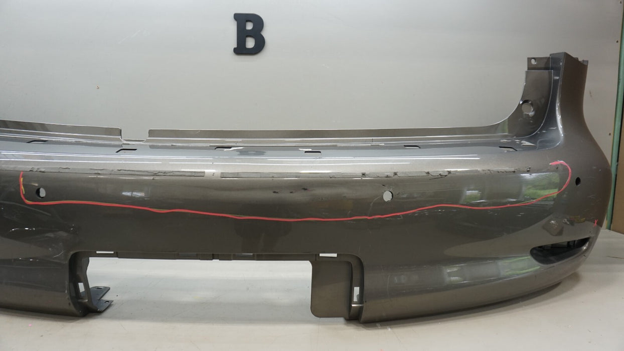 2011-2013 INFINITI QX56 REAR BUMPER COVER PANEL W/ SENSOR HOLE OEM 85022-1LA0H