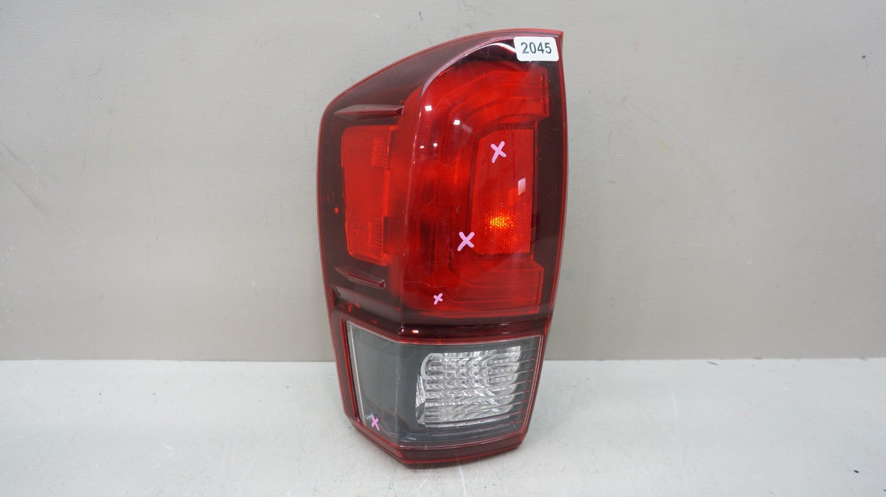 2016-2023 TOYOTA TACOMA REAR LEFT DRIVERS SIDE TAIL LIGHT OEM