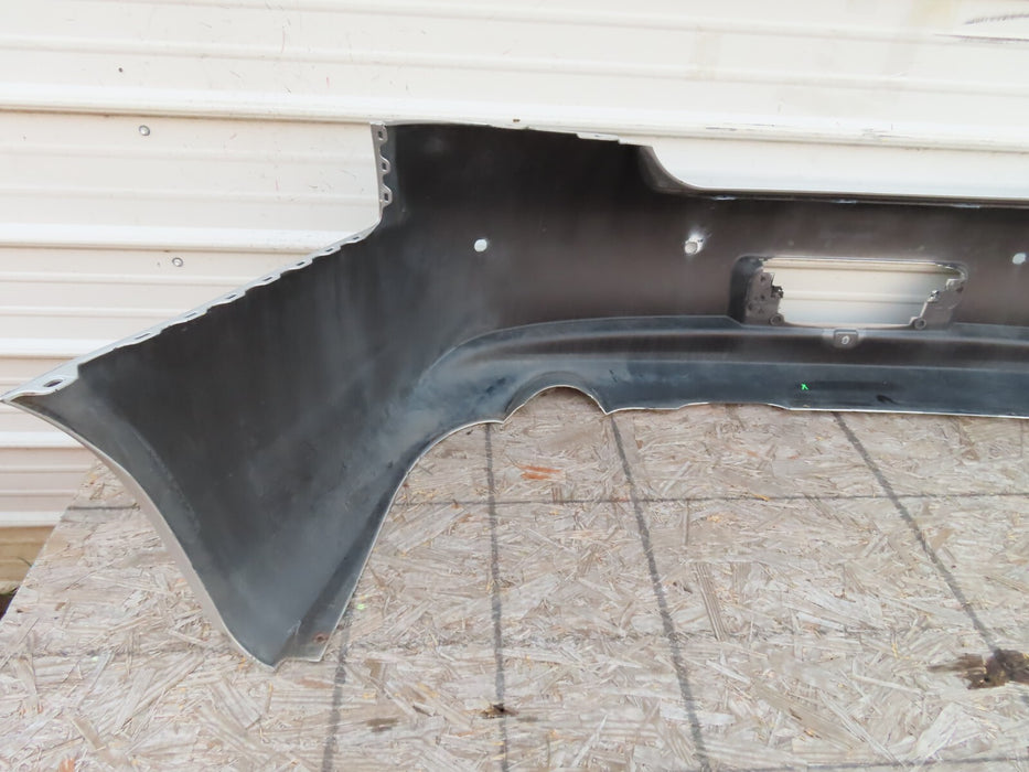 2010-2013 INFINITI G25 G35 Q40 REAR BUMPER COVER OEM
