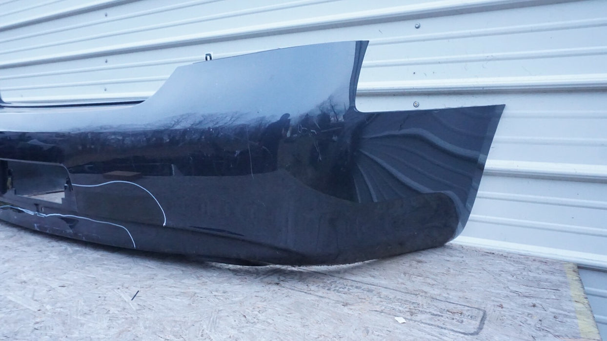 2010-2013 INFINITI G37 REAR BUMPER COVER PANEL PLASTIC 850221NF0H OEM 12 13